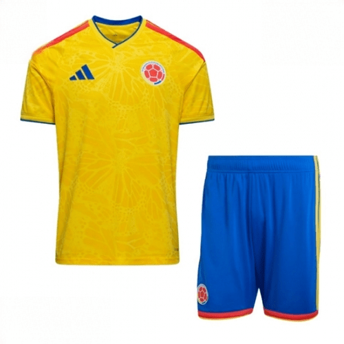 Echipament fotbal Columbia Tricou Acasa Mondial 2026 pentru copii şi pantaloni 1 Echipament fotbal Columbia Tricou Acasa Mondial 2026 pentru copii şi pantaloni
